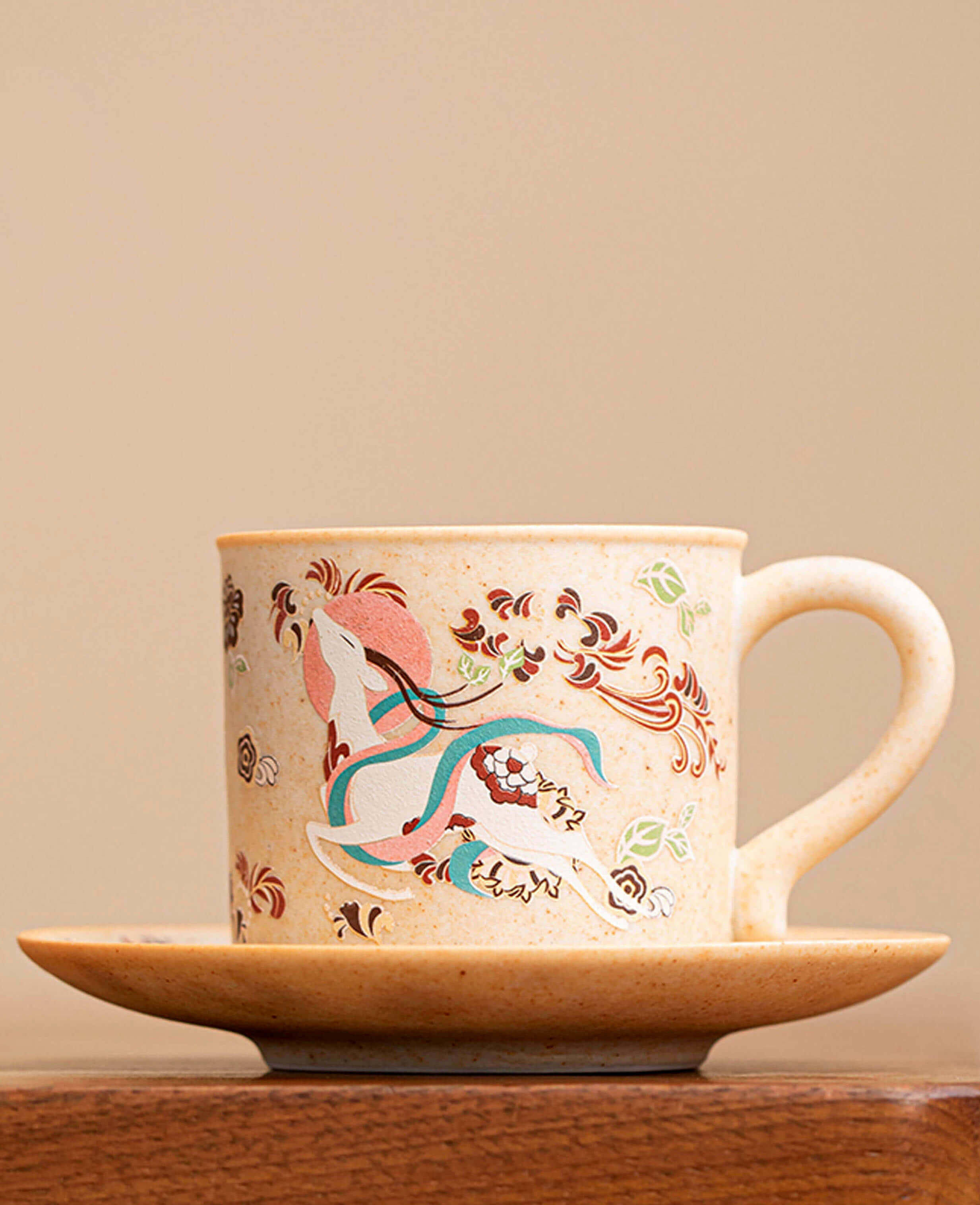 nine coloured deer handcrafted artisan ceramic coffee cup and saucer representing apsara collection