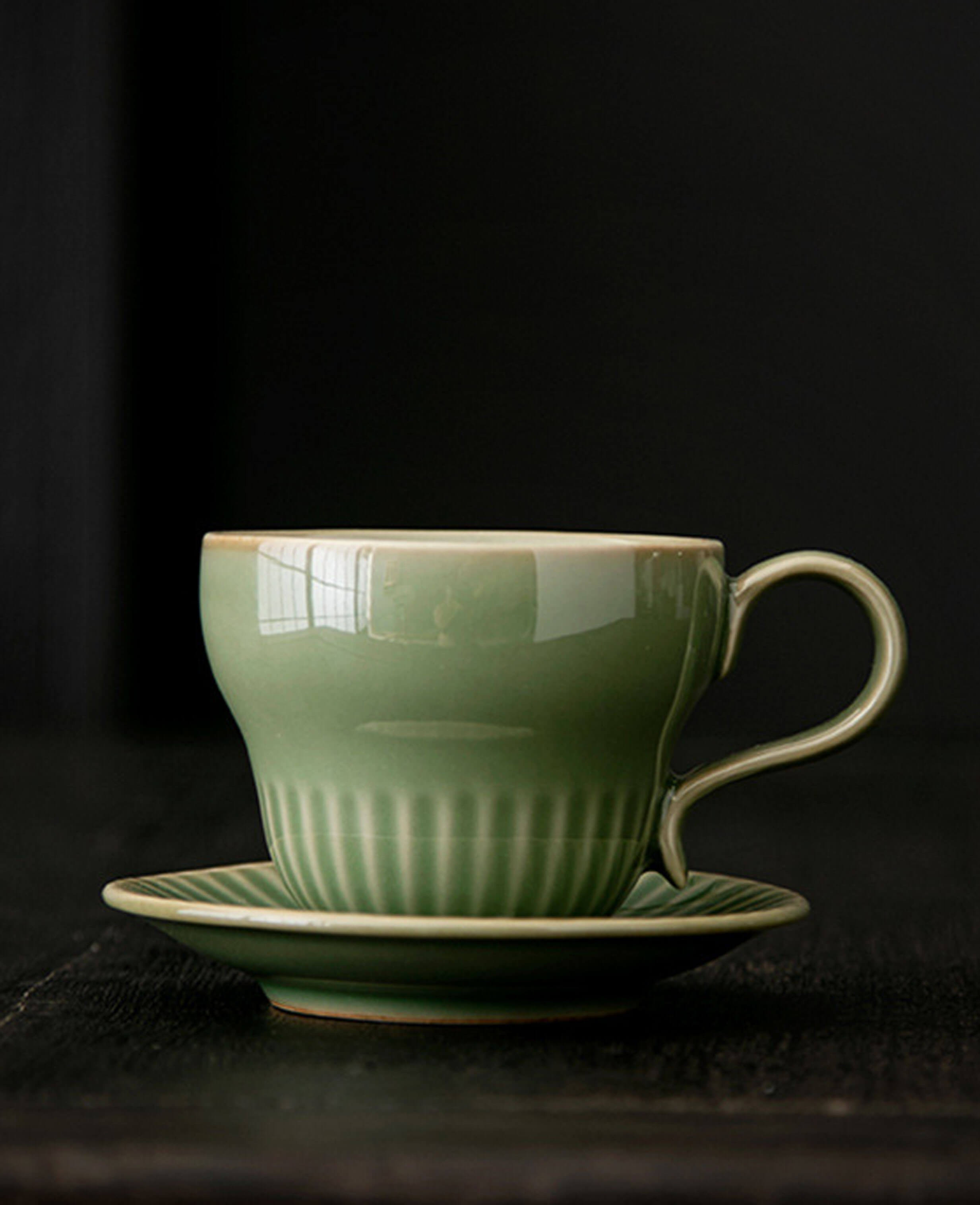 greenstill crest handcrafted green porcelain coffee cup and saucer with fluted detailing