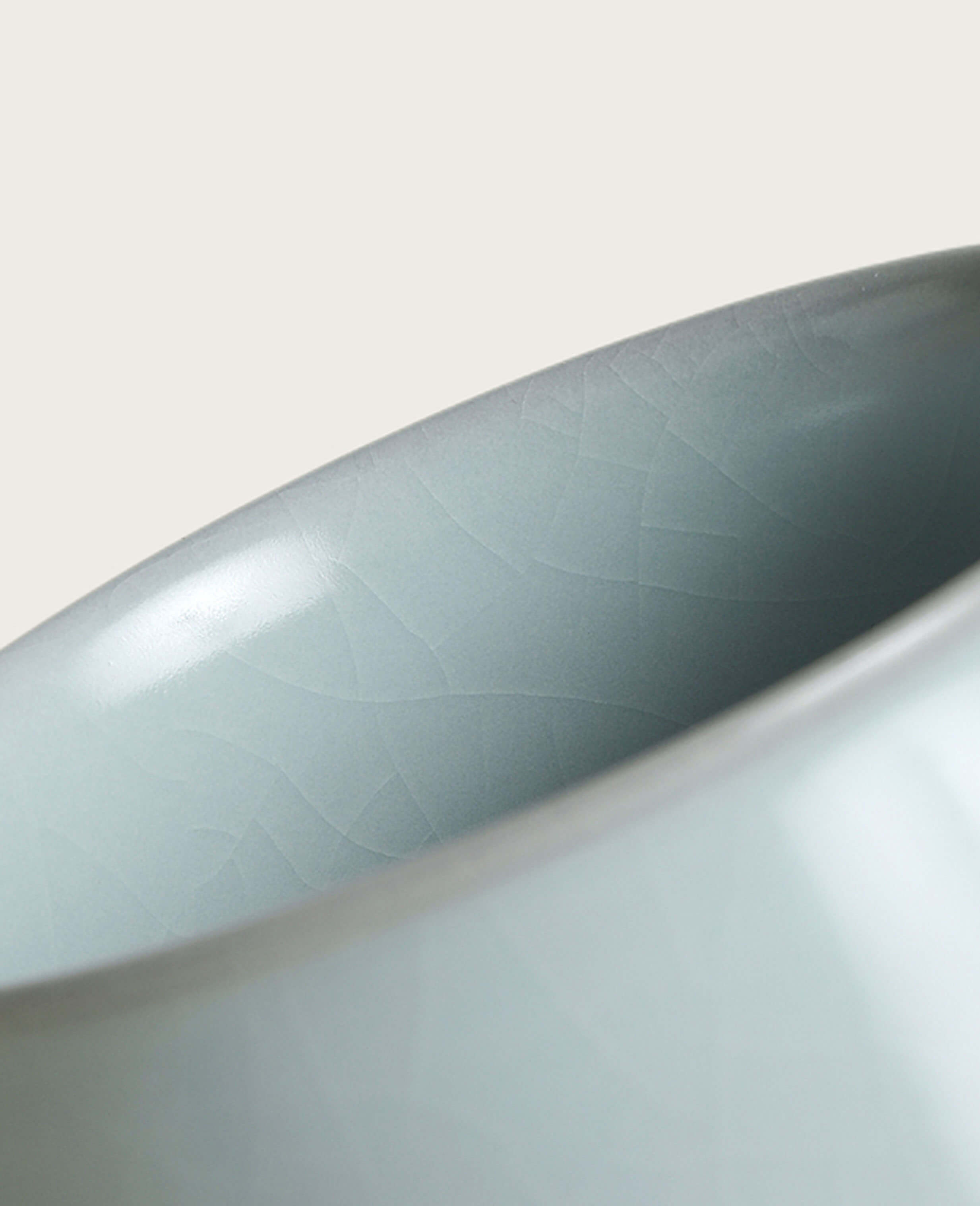 interior view of ru inspired porcelain mug highlighting delicate celadon crackles