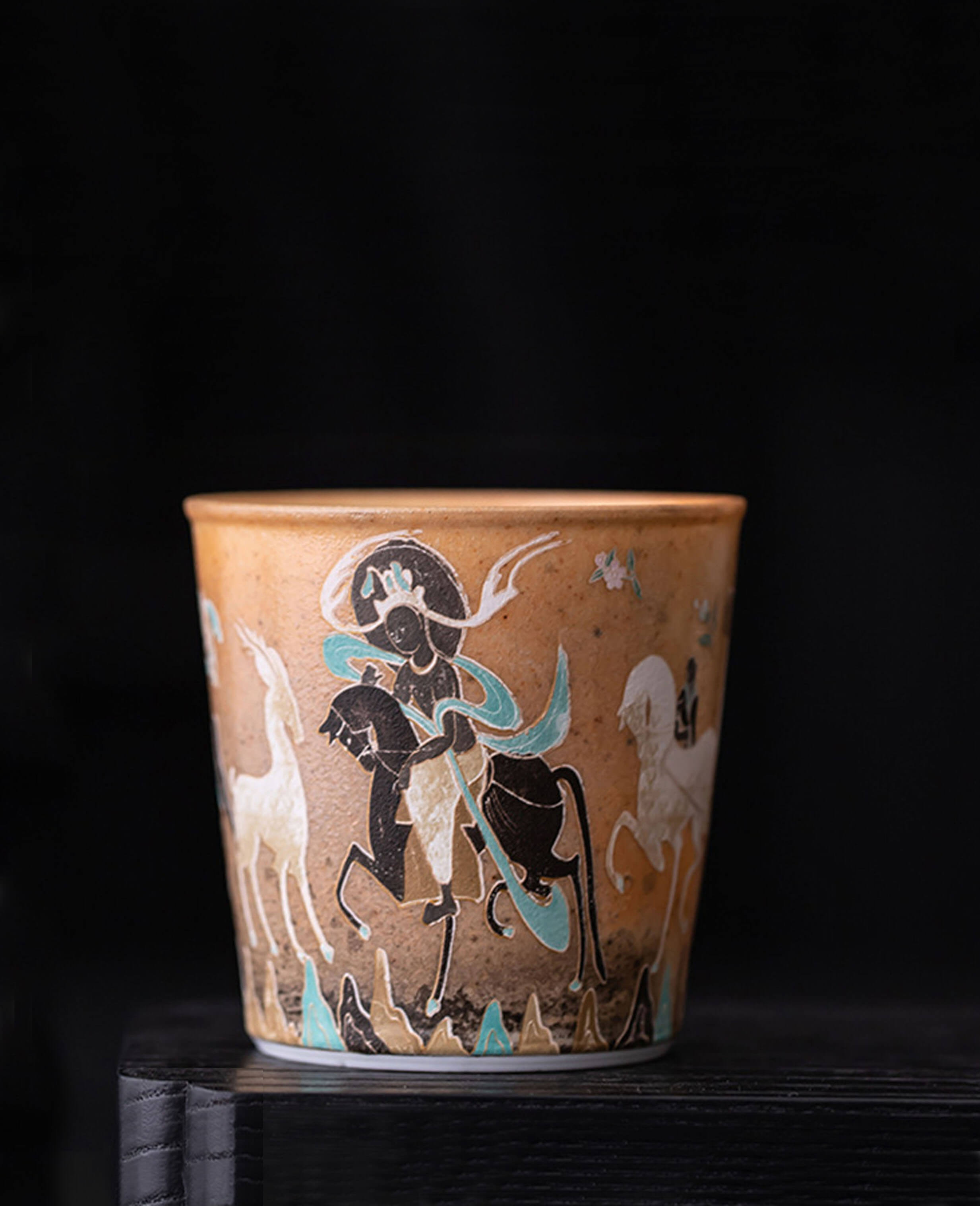 studio image of moonlit journey tea and coffee cup with soft lighting highlighting the elegance of its celestial illustration
