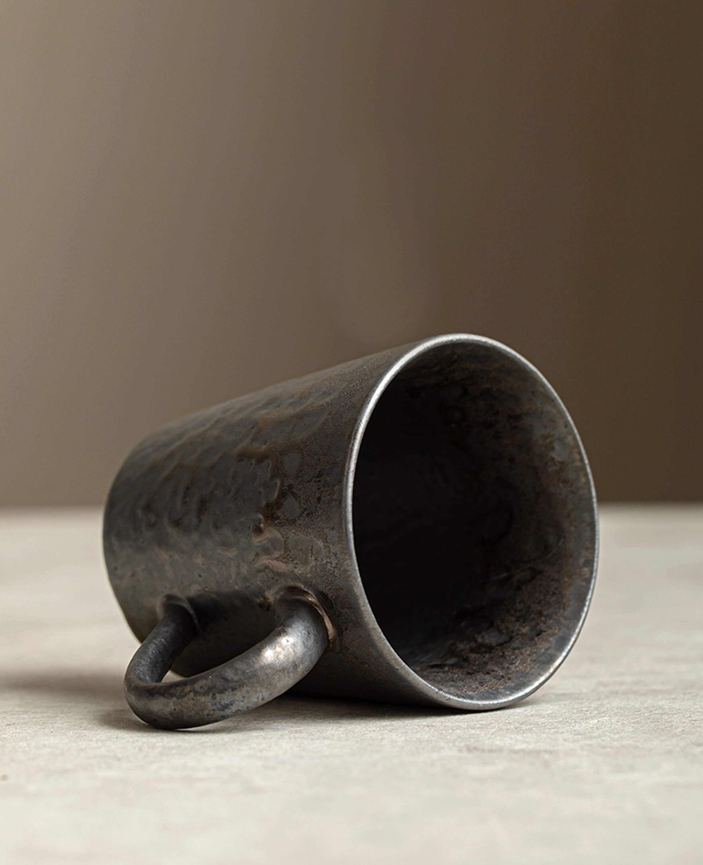 rustglow cove rustic tumbler style coffee mug lying on its side