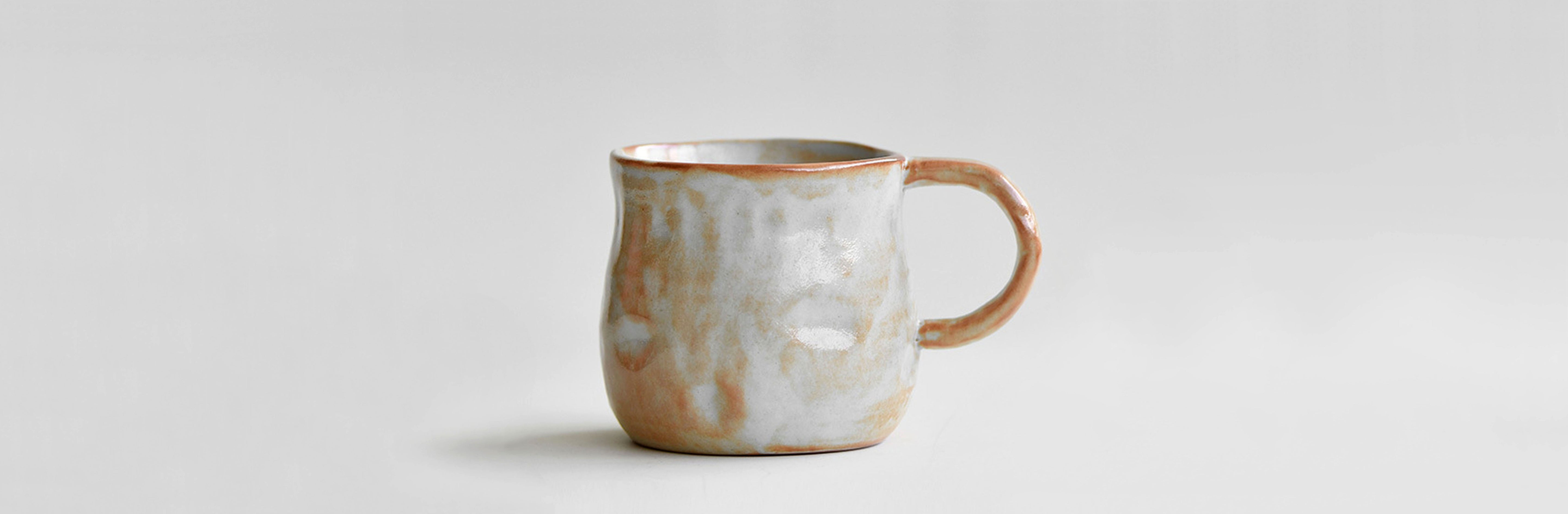 snowcrest handcrafted stoneware mug for coffee and tea with artisan design desktop homepage slide