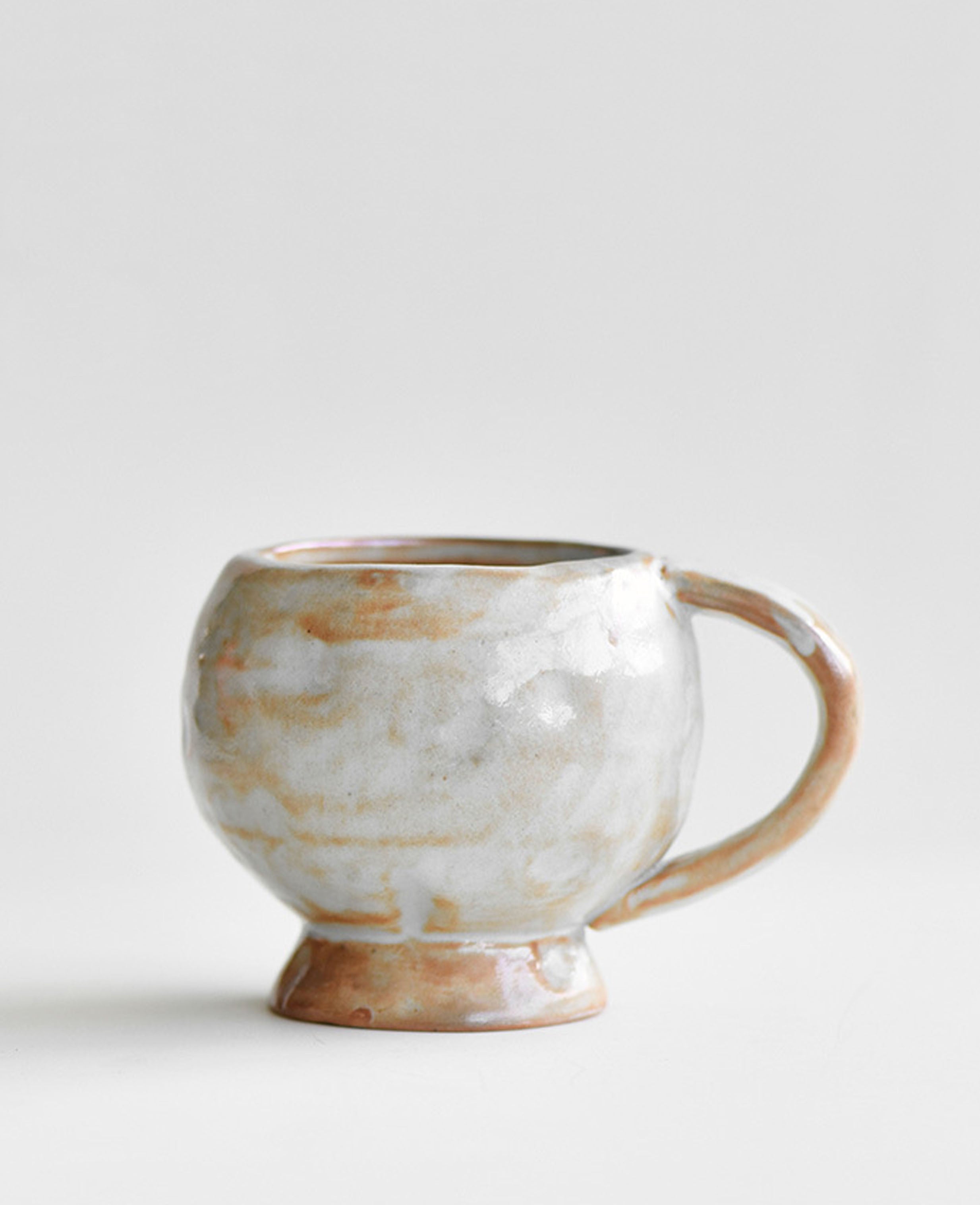solterra handmade ceramic coffee and tea cup showing earthy textured glaze from the front