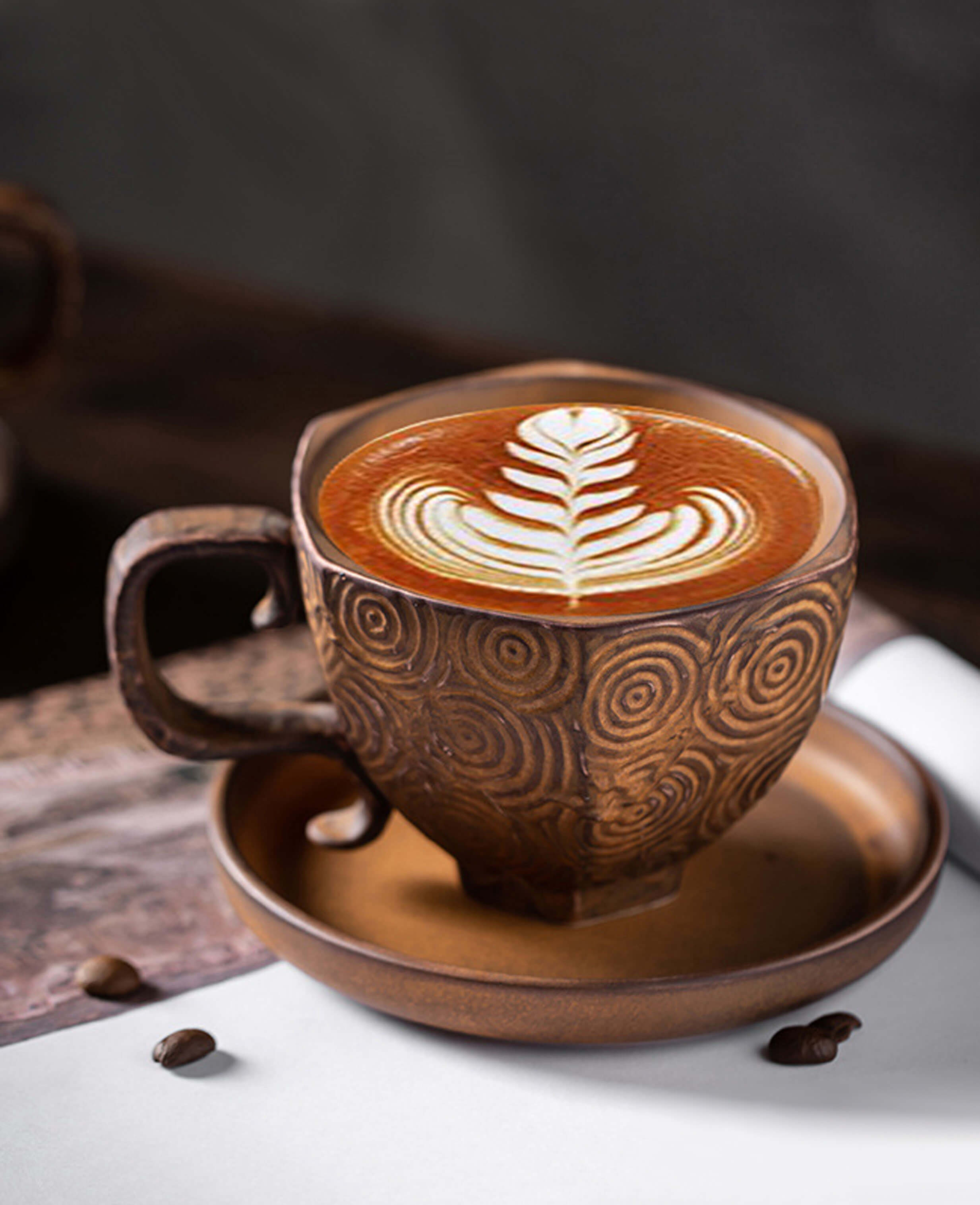 toffee reverie mirage coffee cup with latte art in cup on dark wooden table