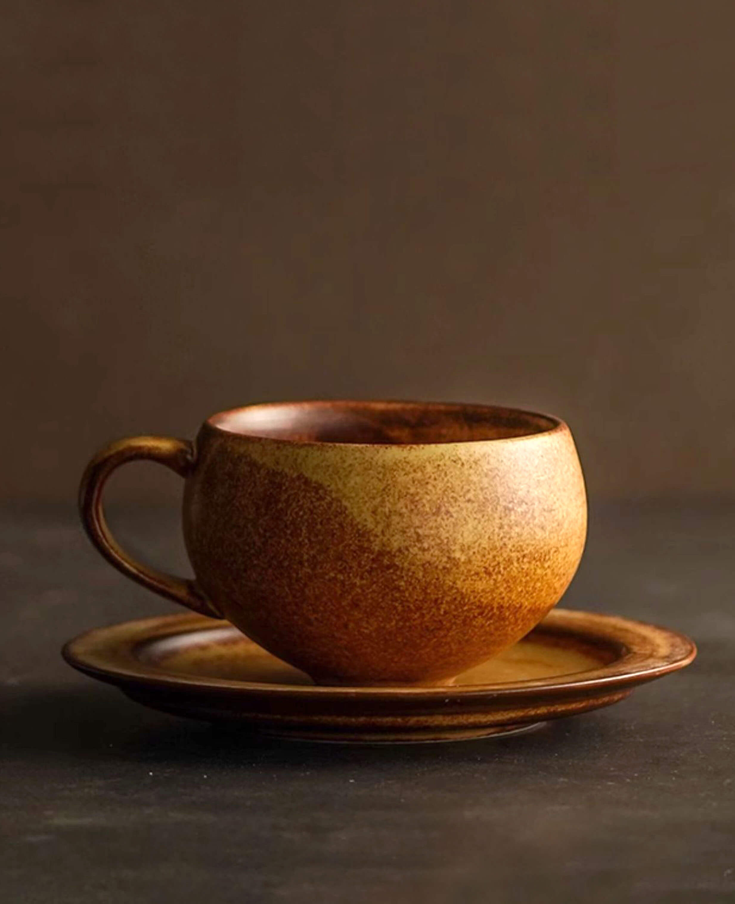 toffee reverie ovolo ceramic coffee cup and saucer front view showing smooth curved shape