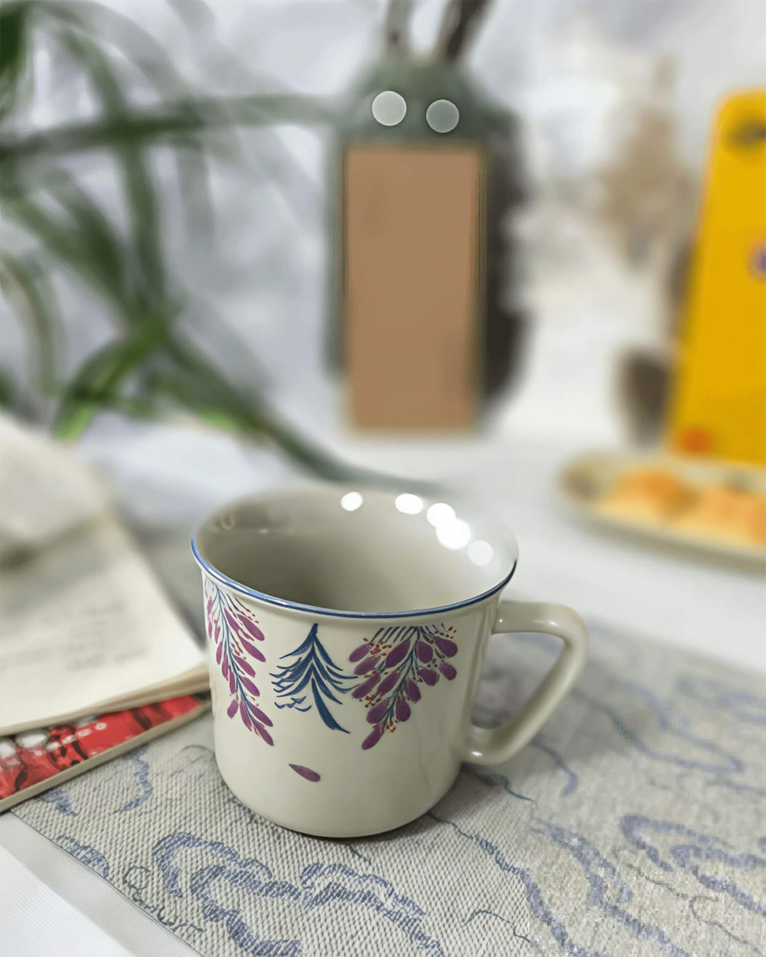 wisteria trace hand painted porcelain coffee and tea cup on soft patterned fabric from customer review