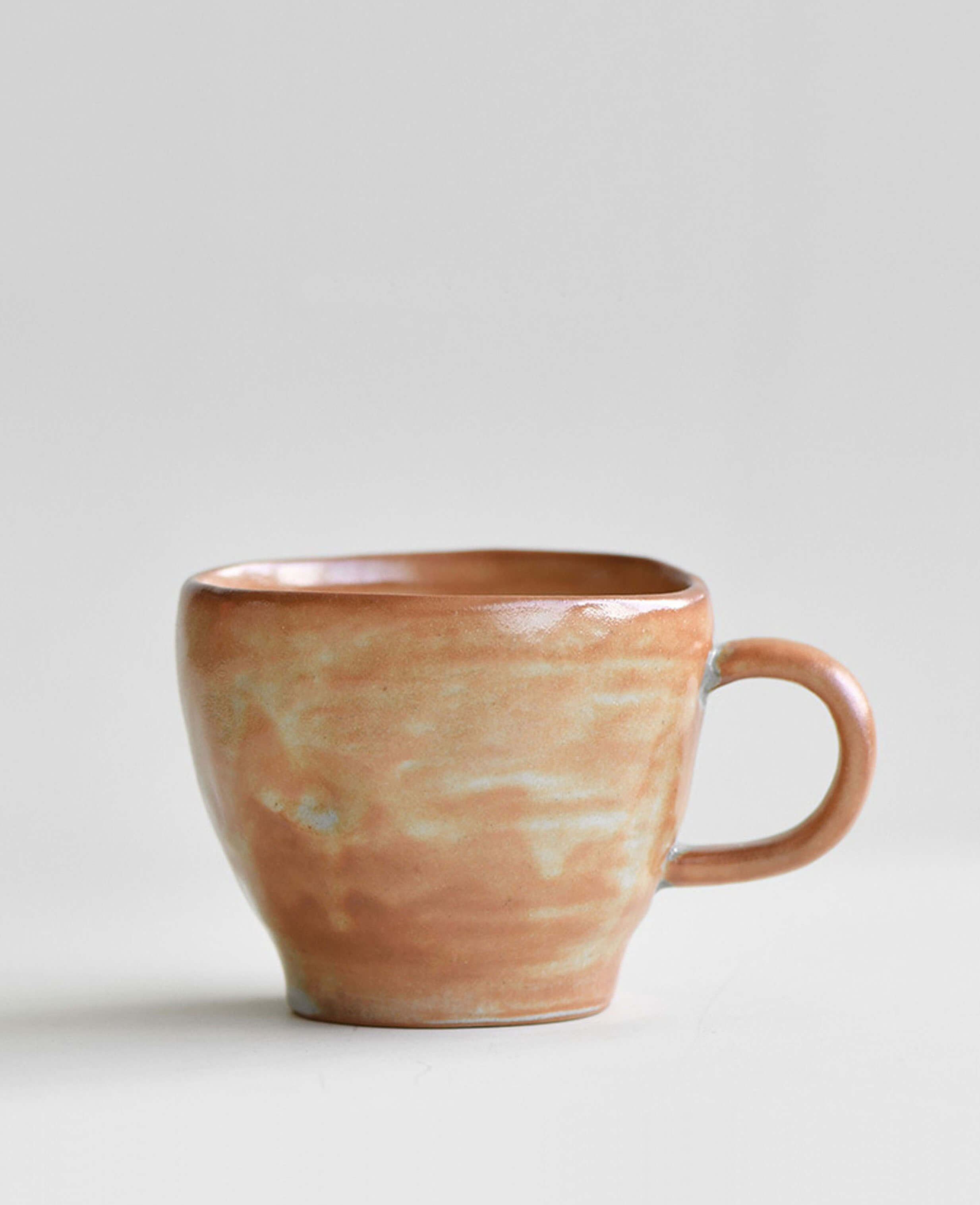 amber veil handcrafted ceramic coffee and tea cup with warm terracotta glaze