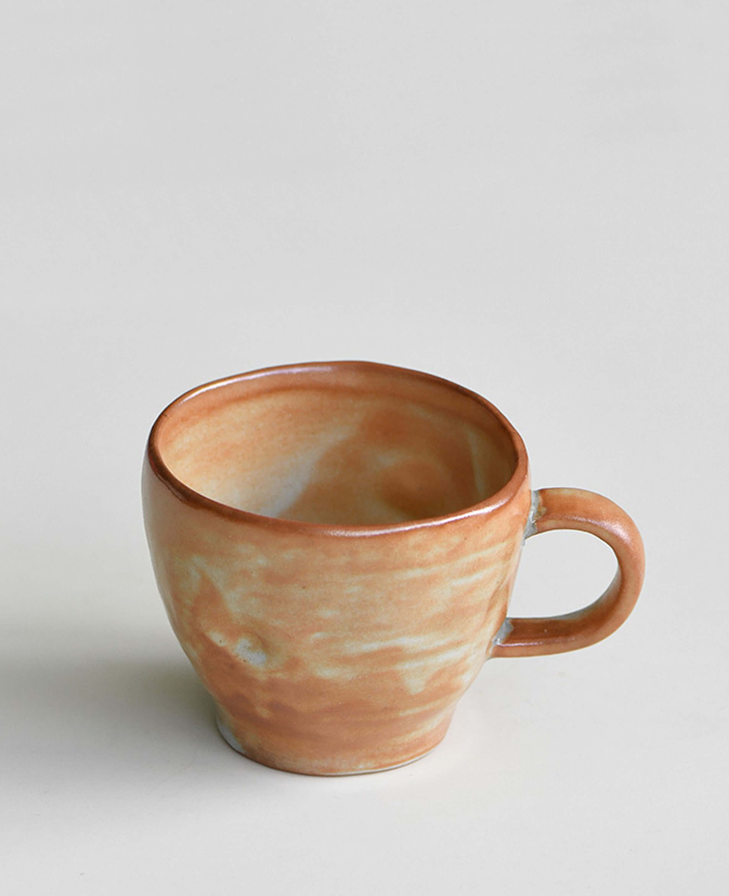 amber veil handmade ceramic pottery coffee cup with warm earthy glaze and organic shape