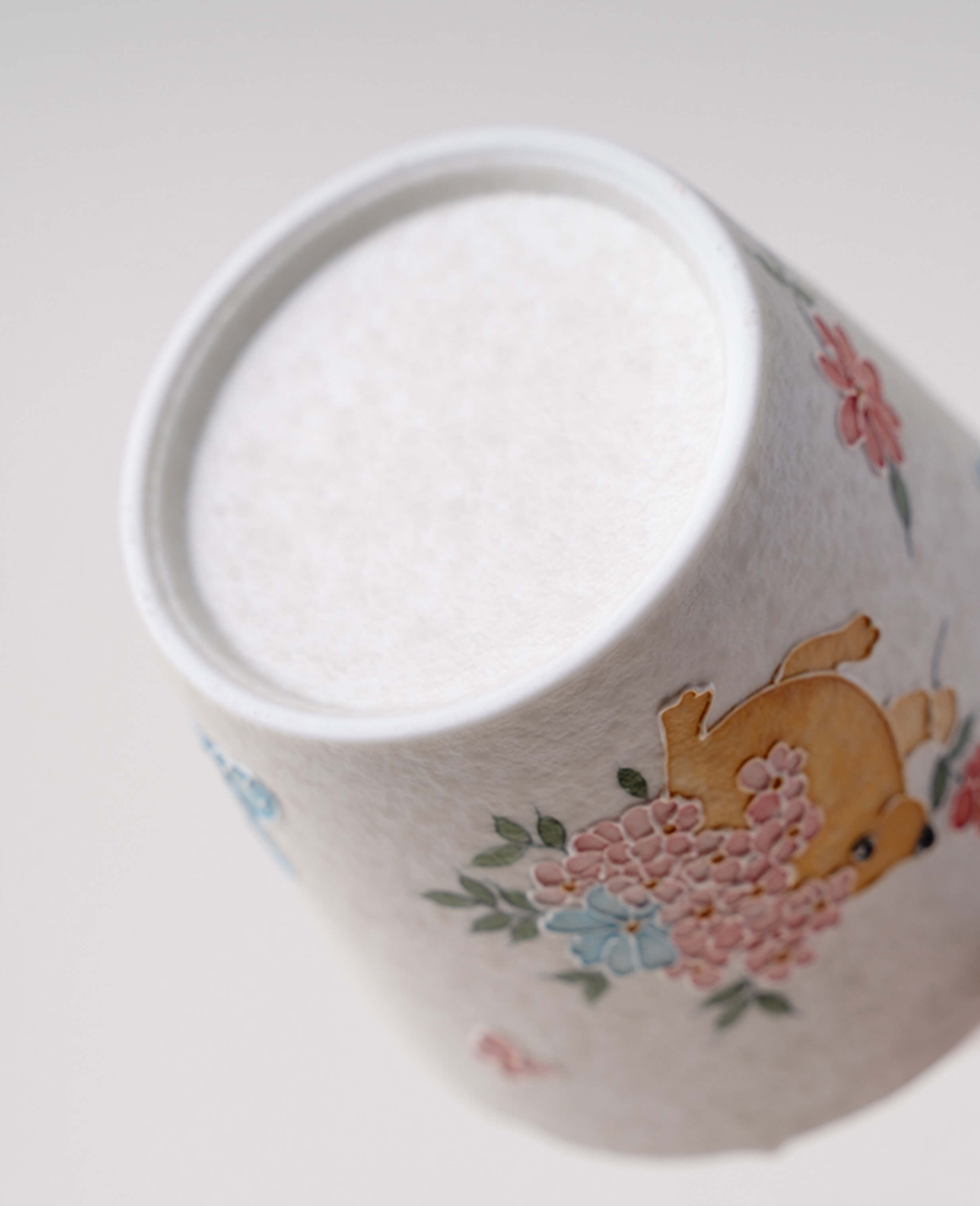 bottom detail of kindred waltz porcelain coffee and tea cup highlighting handcrafted texture and finish