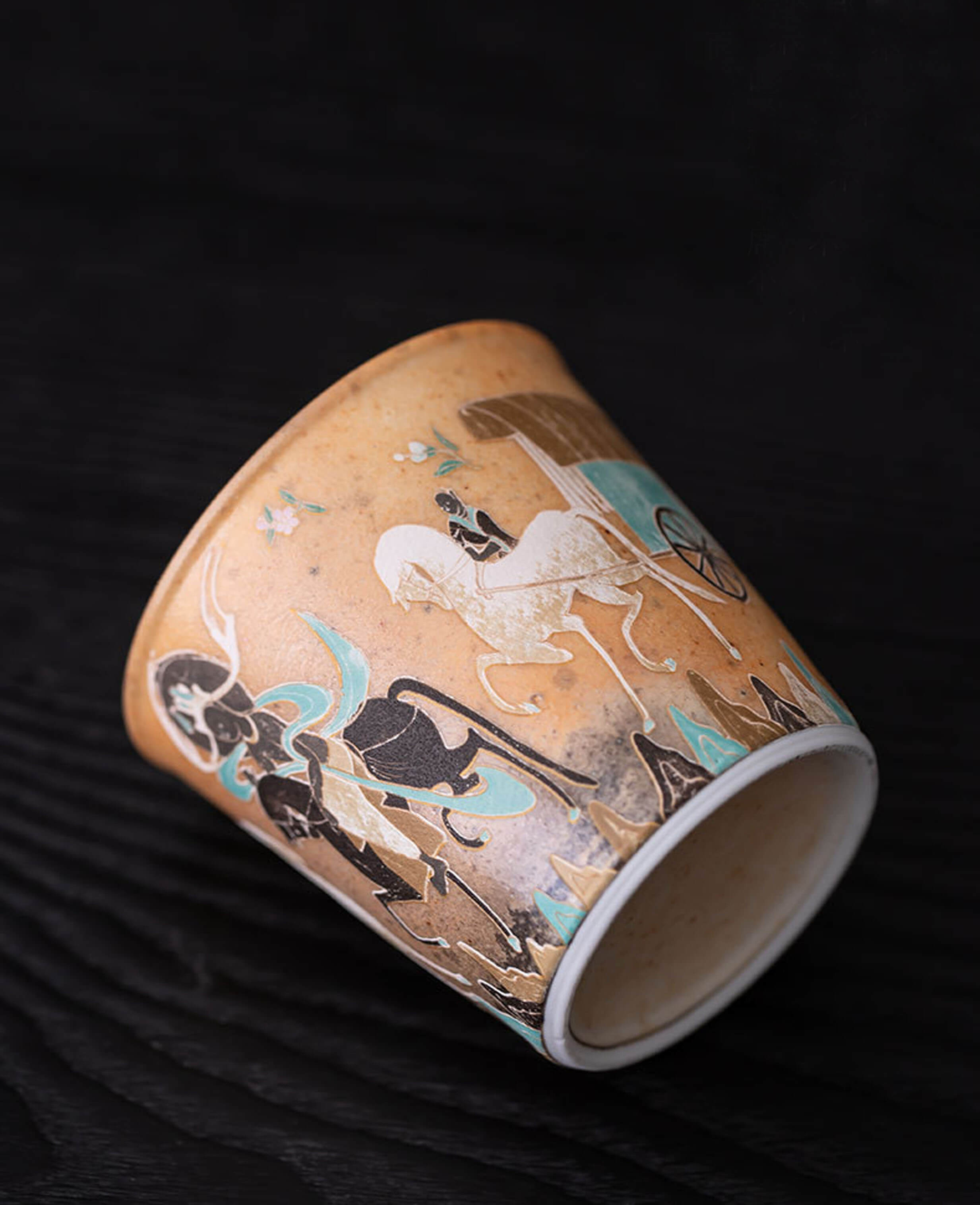 close up side view of moonlit journey aroma cup with detailed horse cart and rider artwork inspired by dunhuang murals