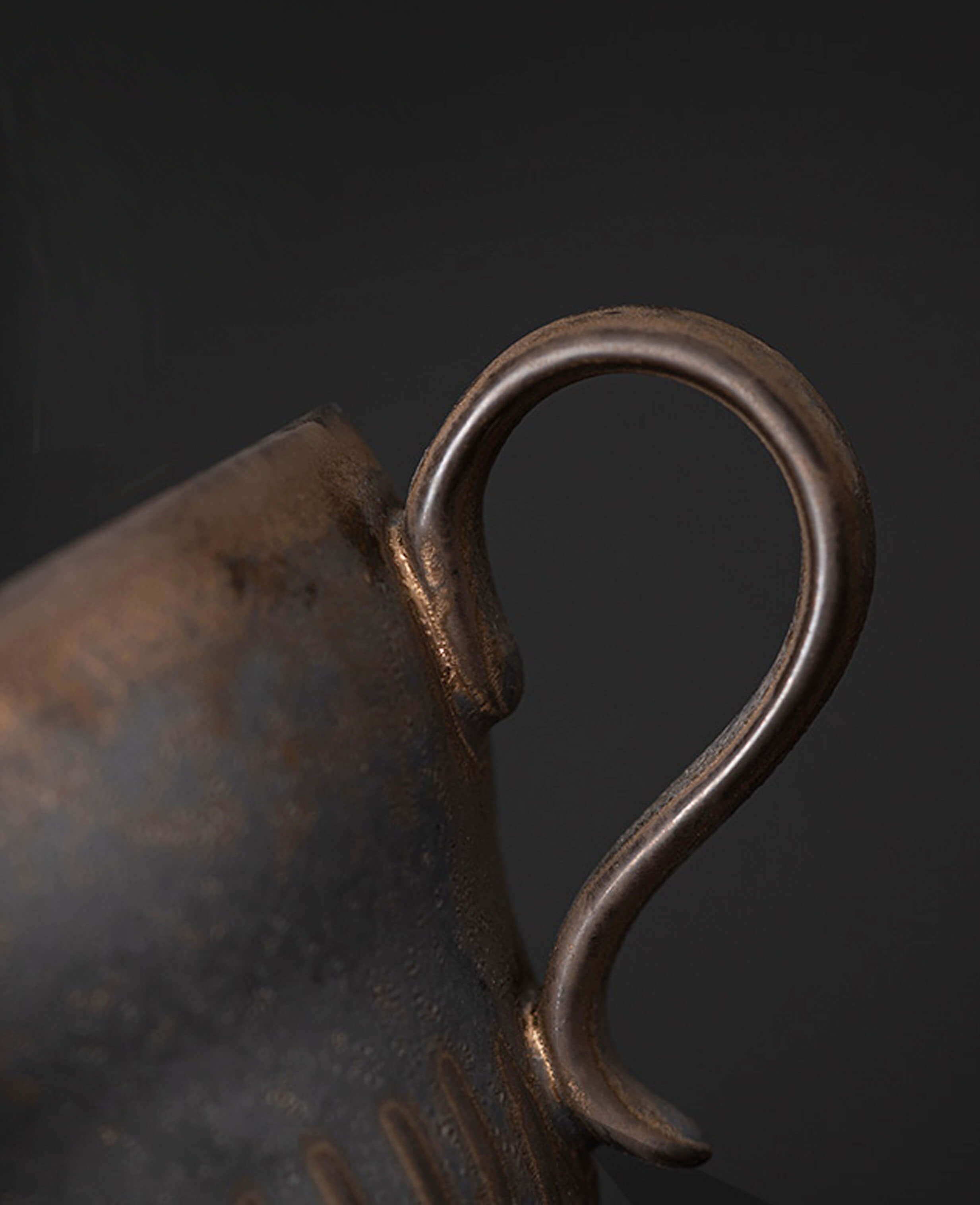 rustglow crest ceramic coffee cup handle detail and surface texture