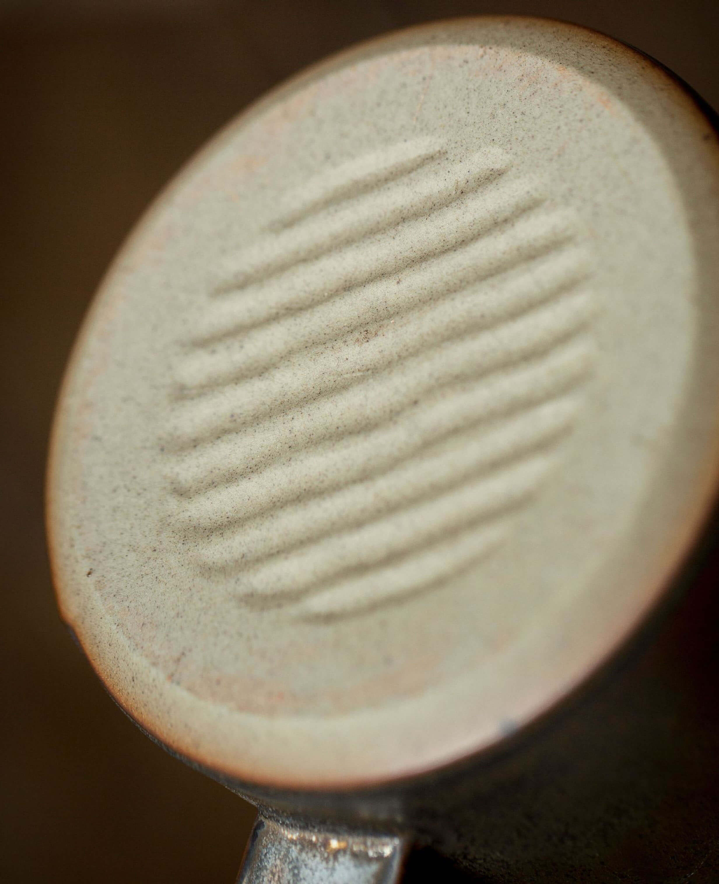 close-up of ironhold mug base showing unique texture