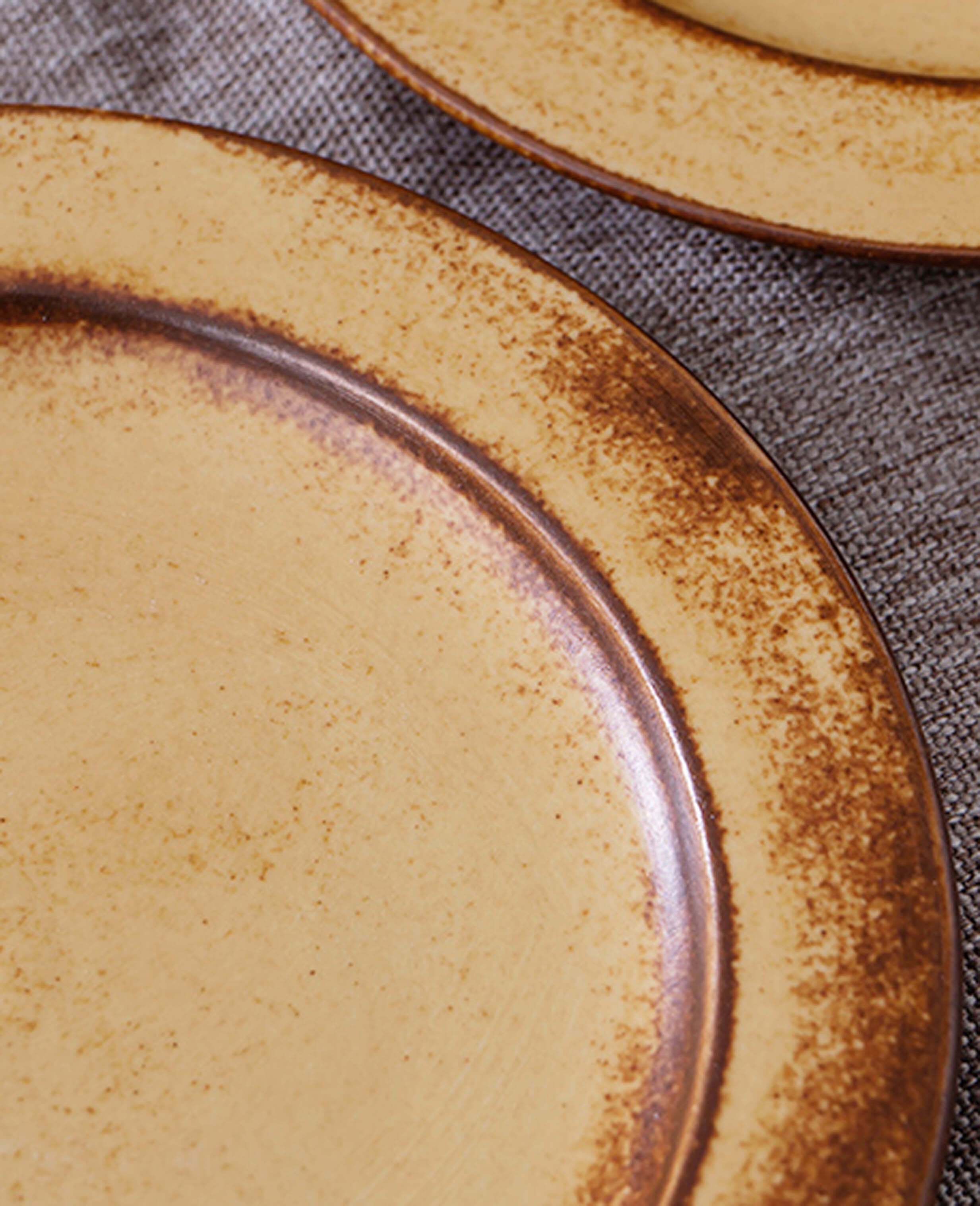 matching ceramic saucers in toffee reverie thalen coffee mug set with speckled finish